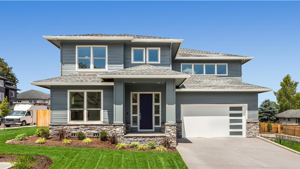 a crew of roofers installing shingles